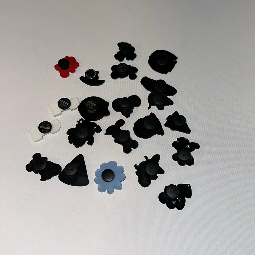 21 ASSORTED CROC CHARMS